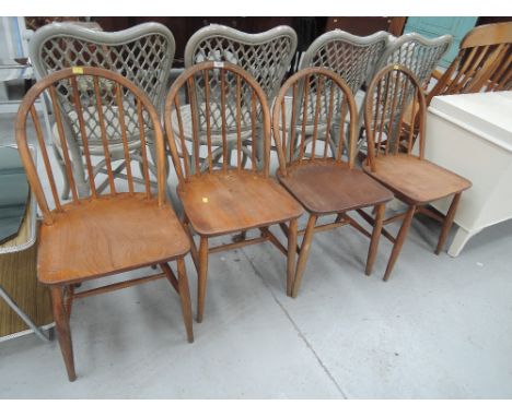 A set of spindle back kitchen chairs, possibly Ercol, stamped with kite mark BS1960 BF2056