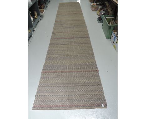 Two carpet runner approx 16' x 3'One in good condition and one has a small rip on edge about 4"