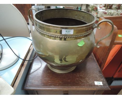 A brass two handled planter