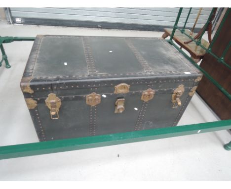 A large early 20th century travel trunk with original lining and compartments by Beller Travelling goods