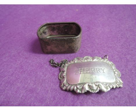 An HM silver Sherry decanter label and an  HM silver napkin ring having engine turned decoration