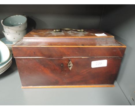 A vintage treen tea caddy