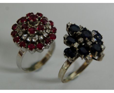 A white metal diamond and ruby cluster dress ring stamped 14k together with a gem set silver cluster ring, gross weight 9.3g 