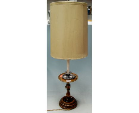 A turned wood and silver plated table lamp and shade