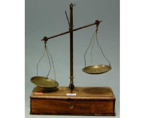 A set of 19th century mahogany cased brass balance scales signed J Hare