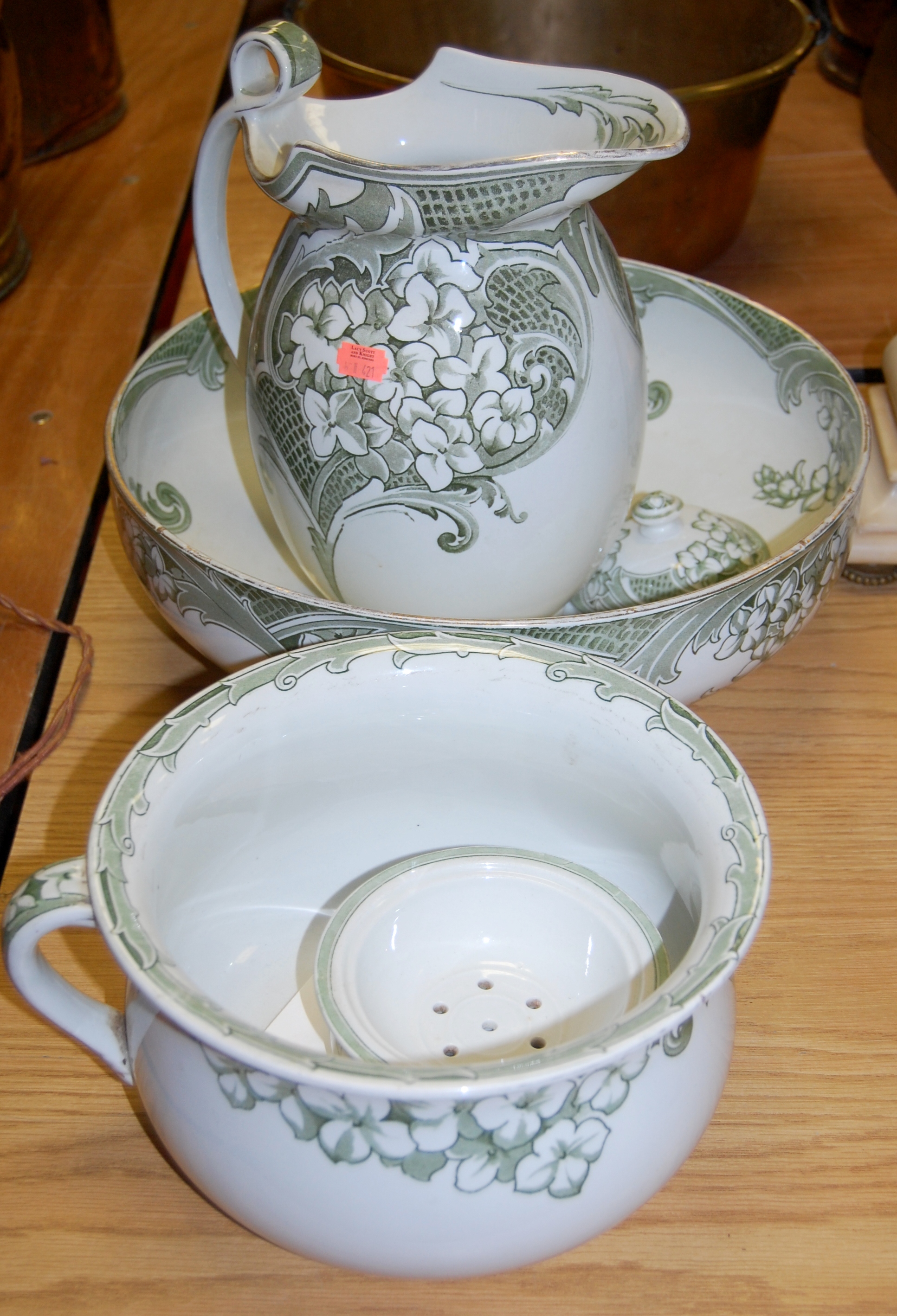 A Royal Doulton Hydrangea pattern toilet set comprising jug and bowl