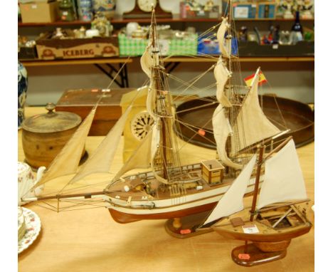 A scale model of the ship Aurora, together with one other smaller model ship (2)