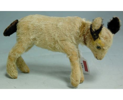 An early 20th century Steiff straw-filled lamb 