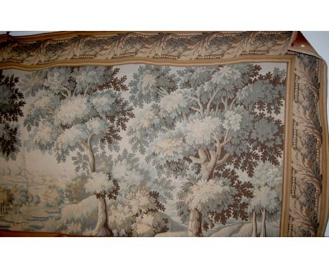 A large machine woven tapestry wall hanging depicting woodland scene Condition Report / Extra Information Approx. 390 x 240cm