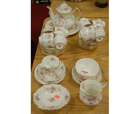 A Paragon six place setting tea service in the Victoriana Rose pattern