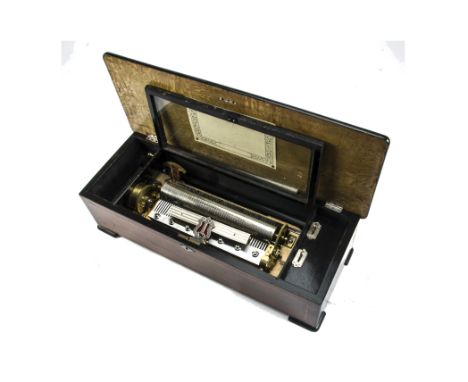 A musical box, playing twelve airs, with nickel plated cylinder, tune indicator, zither attachment, modern (blank) tune sheet