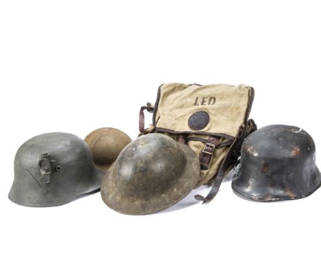 Film Props,  a number of items possibly used as film props at Elstree Studio - two German helmets, two British helmets and a 