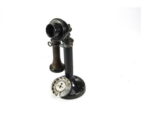 A telephone, a black candlestick type with oxidised fittings, marked PL30, 234 and No. 150, with chromium dial (no wires) 