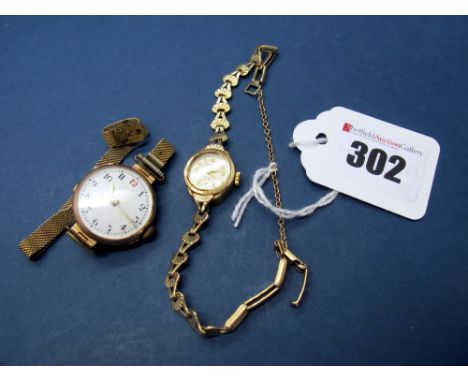 Rotary; A 9ct Gold Cased Ladies Wristwatch, the signed dial with Arabic numerals and dagger markers, within shaped case, to i