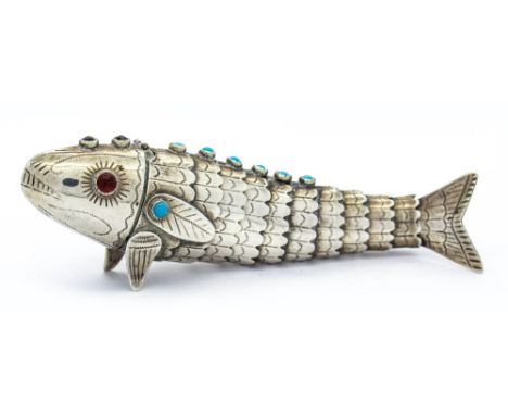 A Continental Articulated Fish Snuff Box, indistinctly stamped, with collet set cabochon highlights and hinged head, 11cms lo