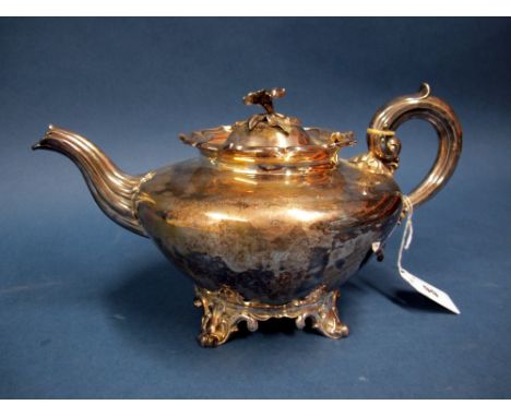 A Hallmarked Silver Teapot, Messrs Barnard, London 1838, of circular form with scroll loop handle and flowerhead finial to hi