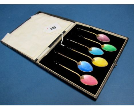 A Matched Set of Six Hallmarked Silver and Harlequin Enamel Coffee Spoons, T&S, Birmingham 1959, 1963, each with coffee bean 