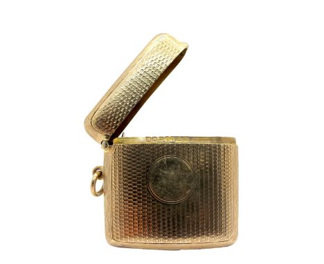 A 9ct Gold Vesta Case, of rounded square form, allover engine turned, with side suspension loop, H. Matthews, Birmingham 1922