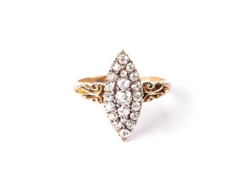 A LATE VICTORIAN DIAMOND RING Centred with a navette-shaped motif set with old-cut diamonds weighing approximately 0.70cts in