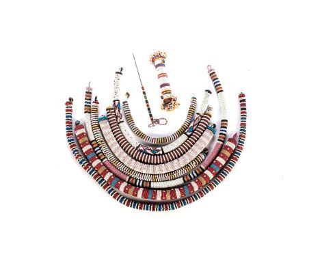 A COLLECTION OF TEN NGUNI BEADWORK PIECES, SOUTH-EASTERN AFRICA, POSSIBLY LATE 19th century Eight round rope necklaces, one b