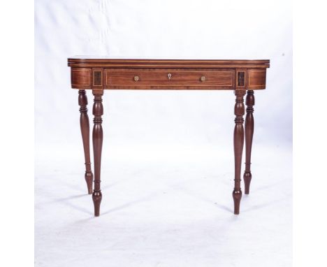 A VICTORIAN MAHOGANY TEA TABLE The hinged rounded rectangular top above a frieze drawer, on ring-turned tapering legs74cm hig