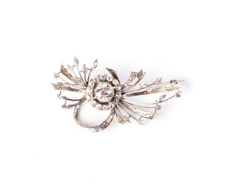 A DIAMOND SPRAY BROOCH Claw-set to the centre with an old-cut diamond weighing approximately 1,80ct, approxiamate colour M/N 