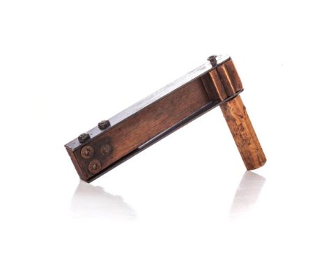 A FIRST WORLD WAR BRITISH ARMY WOODEN GAS RATTLE, W.B. LTD, 1918 The iron mounted wooden mechanism on a faceted wooden handle