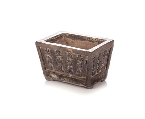 A CHINESE GREY POTTERY BONSAI PLANTER, QING DYNASTY, LATE 19TH CENTURY The rectangular body raised on bracket feet, the taper