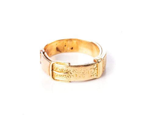 A GOLD RING Designed as a buckled belt, acid tested as 18ct, distress, ring size N1/2 