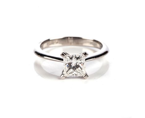 A DIAMOND SOLITAIRE RING Claw-set to the centre with a square modified brilliant-cut diamond weighing 1.11ct, impressed Pt, r