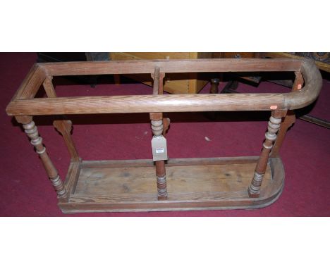 A Victorian pitched pine twin division long stick stand, width 120cm