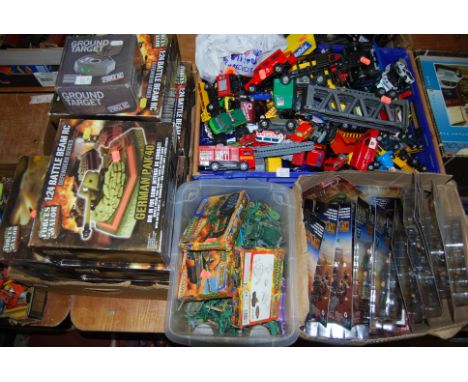 Four boxes containing a large quantity of mixed loose diecast vehicles, boxed Forces of Valour Defender series remote control