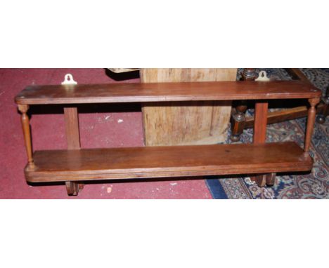 A mahogany round cornered two-tier hanging wall shelf, width 92.5cm, together with a Victorian walnut chess board topped game