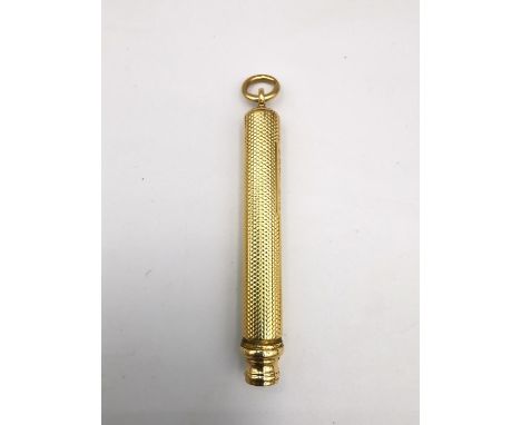 An early 20th century engine turned design Sampson and Morden 18ct gold extending pencil. Hallmarked 18ct. London, 1907. and 