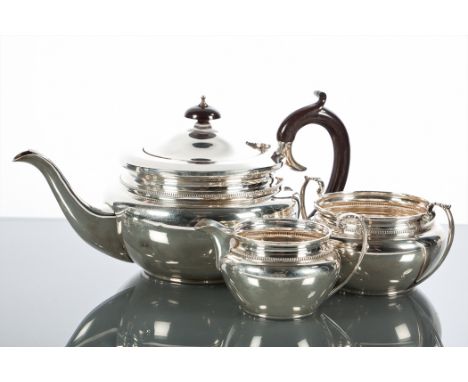 SILVER THREE PIECE TEA SERVICE
maker William Adams Ltd, Birmingham 1931, comprising a teapot, sugar and cream, approximately 