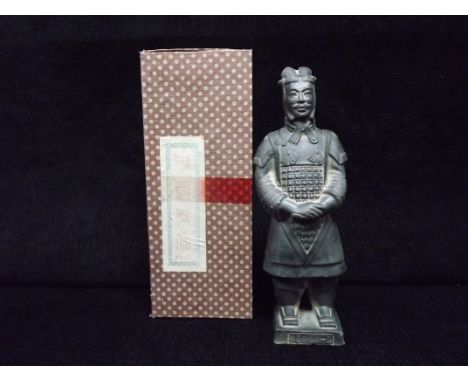 Sino Tibetan 20th century - Chinese Terracotta Army Figure in fitted box. Terracotta clay Warrior with matt black glaze. 22.5
