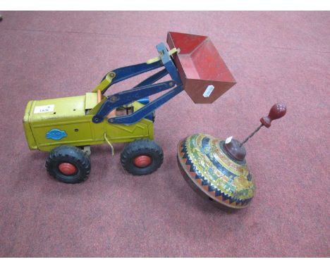 GAMA, Mechanik Tin Plate Tractor, (wheel hub missing), together with a Chad Valley humming top (2).