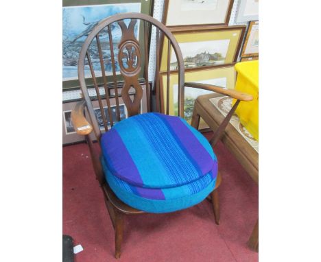 Ercol Mid XX Century Armchair, with fleur de lys and spindle back.