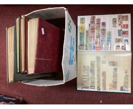 Stamps' A World Stamp Collection, housed in five junior albums, one photo album, and one loose leaf album.