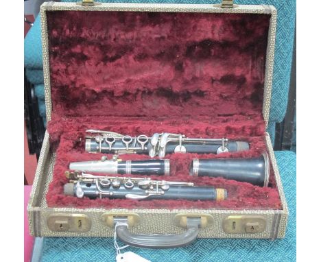 A Selmer Clarinet, stamped 'Harris &amp; Nixon', cased.