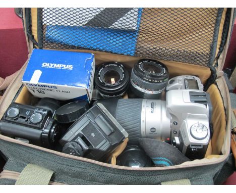 Cameras; Olympus OM10 body with 50mm kit lens, Minolta 505si super with 75-300mm lens, Olympus OM101 power focus together wit