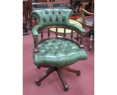 Green Leather Button Back Office Chair, with spindle supports, swivel action on five star base.