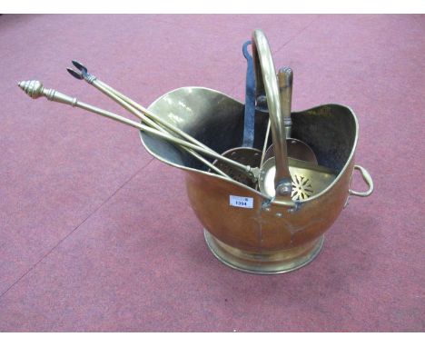 XIX Century Brass Coal Helmet, fire irons, copper shovel and skimmer.