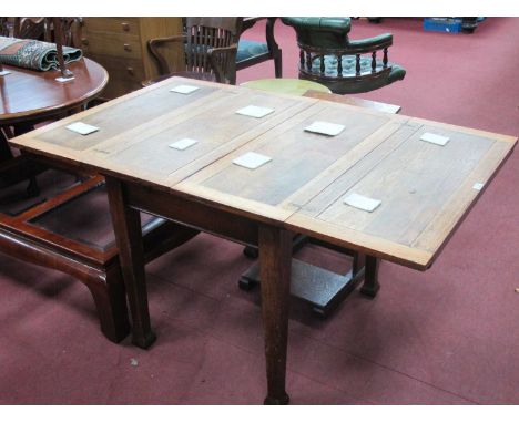 1920's Oak Fold Over Kitchen Table, with concertina action on tapering legs and square feet, 91 x 76cm closed.