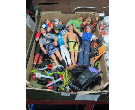 Action Man figures, ten in various outfits, together with various accessories, including guns, back packs, and other weapons: