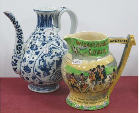 Crown Devon 'Widdecombe Fair' Musical Jug, Oriental ewer in blue and white pottery, 22.5cm high. (2).Blue and white jug, no v