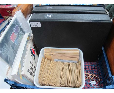 Two Albums of First Day Covers (World Wide Fund), a square tub of packets of stamps from different Countries:- One Basket.