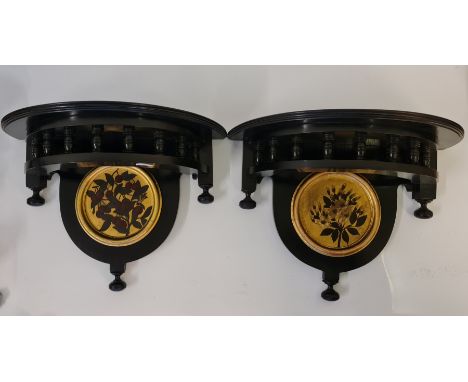 A pair of late Victorian decorative wall bracket shelves with gilded central hand painted panels, 8.5cm x 38cm. IMPORTANT: On