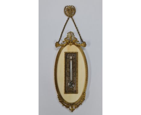 A French style wall mounted mercury filled barometer with silvered face, ivory panel back and brass frame with horn and folia