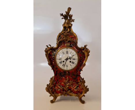 A Marque Deposee French, red Tortoiseshell Boulle clock with ormolu mounts, height 55cm. IMPORTANT: Online viewing and biddin